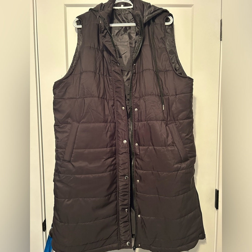 Black puffy vest with hood